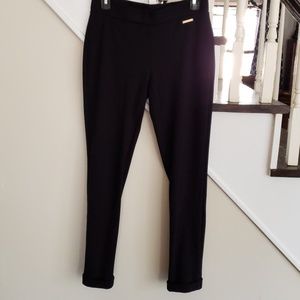 Black slim knit pants by Michael Kors